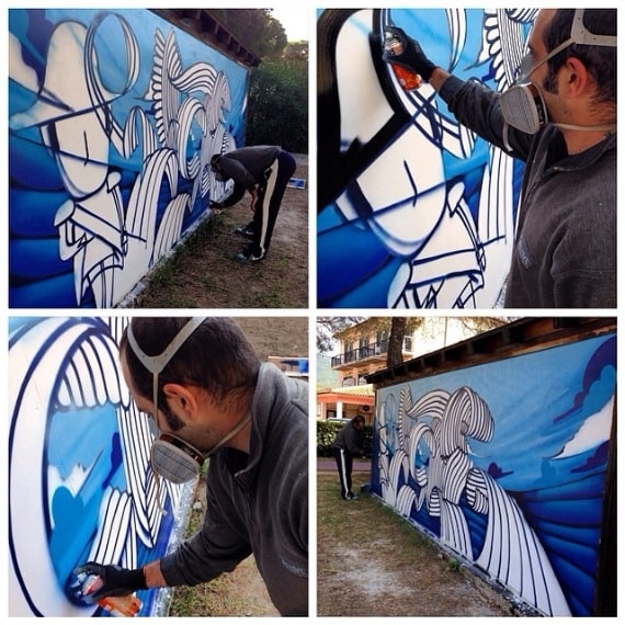 L'artista @stailuan mentre dipinge un murales dedicato a #napoleone200. Credito foto @instatouritalia