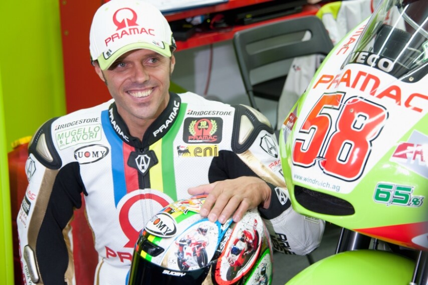 Il Gp di Valencia 2011 è l'ultimo di Loris Capirossi che celebra Marco Simoncelli con il numero 58 sulla carena.