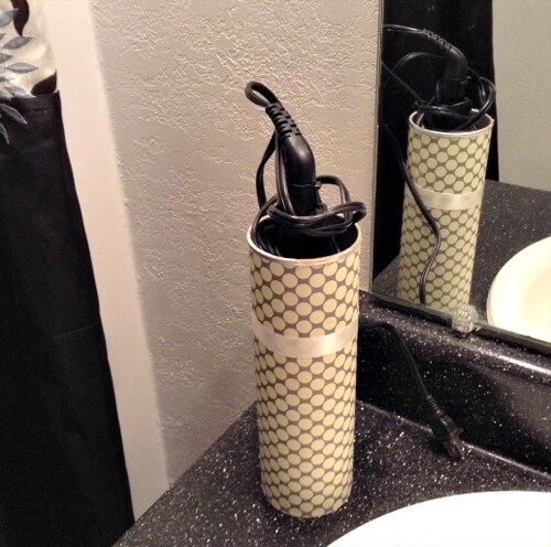 Contenitore dove conservare la piastra per capelli