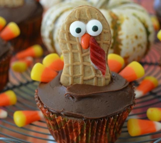 Turkey cupcakes nutter butter, wafer and candy corn. Source: https://homeiswheretheboatis.net/
