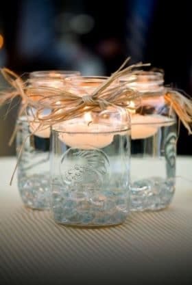 Pour water in the jar and put in a little candles.
