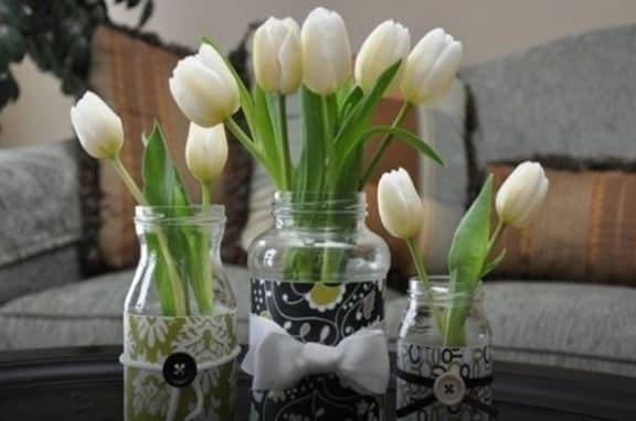 Decorate the jars and trasform them in wonderful flower pots.
