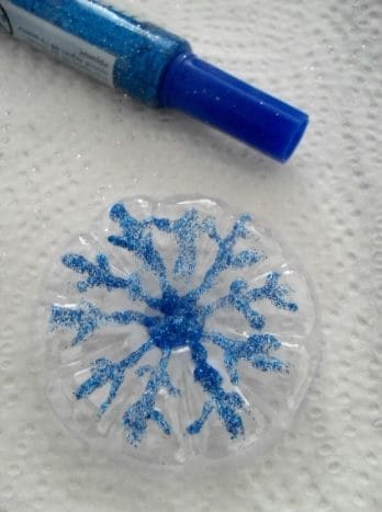 Then make the decorations using a glitter glue pen