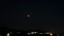 Eclissi di Luna in Italia, le spettacolari immagini da nord a sud
