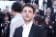 Xavier Dolan in Giorgio Armani con gioielli Boucheron