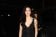 Margareth Qualley in Chanel con sandali Gianvito Rossi