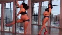 È incinta ma continua a ballare la pole dance: scoppia la polemica