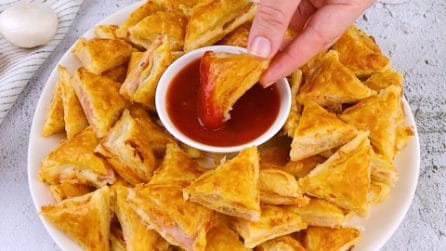 Triangoli di sfoglia salati: perfetti per uno snack semplice e sfizioso!