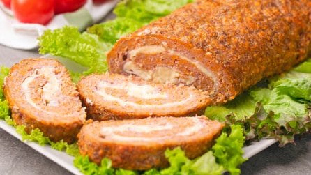 Polpettone con formaggio e prosciutto: la ricetta ideale per una cena saporita!