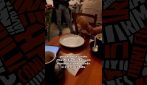 Il video dell'attivista portata via dalla polizia mentre fa colazione in un bar a Mantova