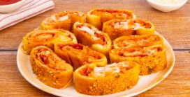 PIZZA STROMBOLI: il gustoso rotolo di pizza ripieno originario degli Stati Uniti!